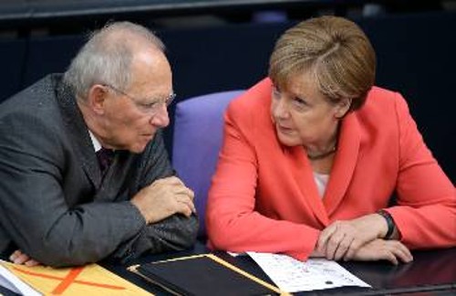 Ο Γερμανός υπουργός Οικονομικών, Β. Σόιμπλε, με την καγκελάριο Α. Μέρκελ