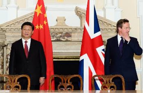 Ο Πρόεδρος της Κίνας και ο Βρετανός πρωθυπουργός στη σινοβρετανική επιχειρηματική συνάντηση