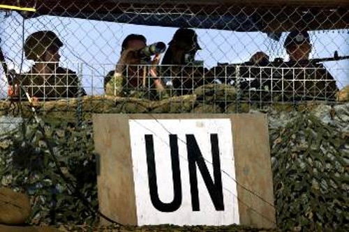Στρατιώτες του ΟΗΕ. Οι παραστρατιωτικοί, τους οποίους εκπαίδευσαν οι Αμερικανοί, σκότωσαν 4 εργαζόμενους του Οργανισμού