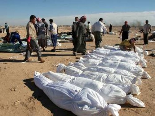 Μαζική ταφή δολοφονημένων στη Νατζάφ