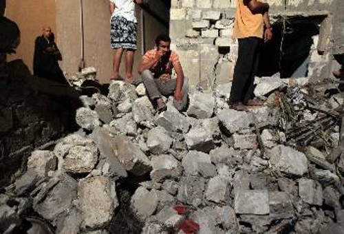Γκρεμισμένα σπίτια σε οικιστικά συγκροτήματα στην Τρίπολη