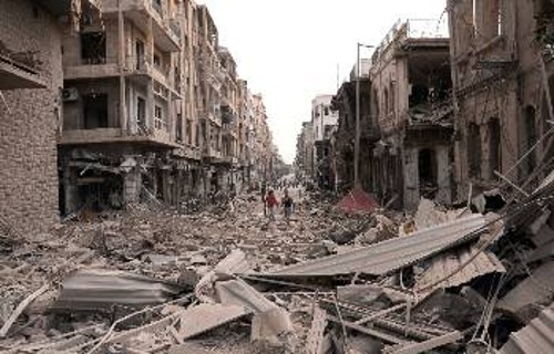 Συνοικία στο Χαλέπι μετά από τριπλή βομβιστική επίθεση των αντικαθεστωτικών που καταδιώκονται από το συριακό στρατό