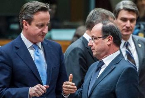 Ο πρωθυπουργός της Βρετανίας Κάμερον και ο Πρόεδρος της Γαλλίας Ολάντ σε κάποια Σύνοδο Κορυφής της ΕΕ