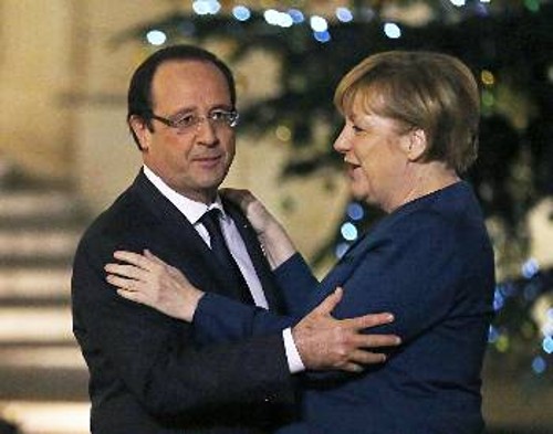 Η Μέρκελ και ο Ολάντ, οι εκπρόσωποι του «γαλλογερμανικού άξονα», που πλέον δεν είναι ακριβώς άξονας ιδιαίτερα στην περίοδο της κρίσης, που ριγμένο βγαίνει το γαλλικό κεφάλαιο