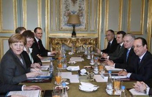 Ο γαλλογερμανικός άξονας, που είχε κλονιστεί, ανασυγκροτείται; (από τη χτεσινή συνάντηση ηγετών και υπουργών στο Παρίσι)