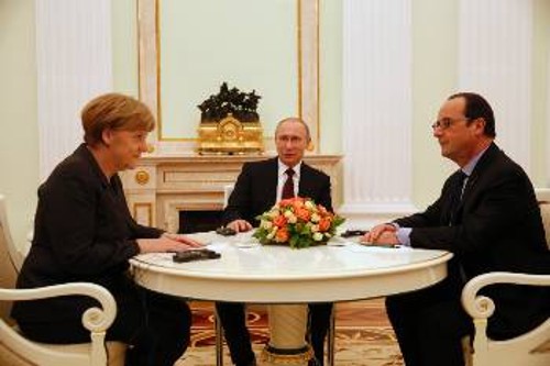 Η Μέρκελ, ο Ολάντ και ο Πούτν συζητάνε στο Κρεμλίνο για την Ουκρανία, δήθεν ευαίσθητοι για την αιματοχυσία του λαού, στην πραγματικότητα για να εξασφαλιστούν οι μπίζνες των μονοπωλίων των χωρών τους