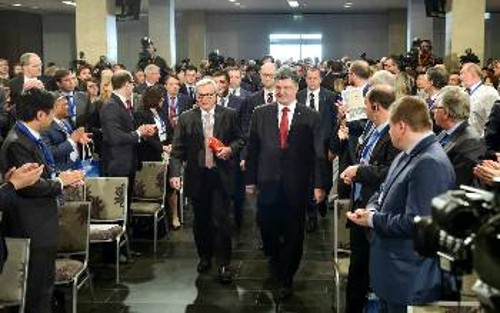 Στελέχη επιχειρήσεων υποδέχονται τους Ποροσένκο και Γιούνκερ, στη Συνδιάσκεψη Υποστήριξης των συμφερόντων τους και όχι της Ουκρανίας