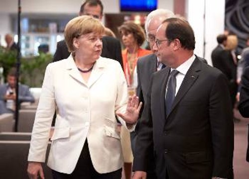Α. Μέρκελ και Φρ. Ολάντ διαφωνούν ριζικά για το μέλλον της Ευρωζώνης