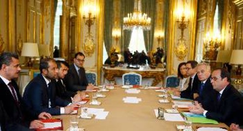 Από τη συνάντηση του Γάλλου Προέδρου με τη λεγόμενη οργάνωση «Λευκά Κράνη», στη Συρία, που χρηματοδοτείται από τους ιμπεριαλιστές
