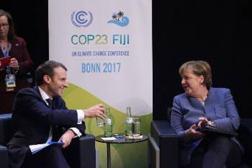 Από τη Διεθνή Διάσκεψη του ΟΗΕ στη Βόννη, οι ηγέτες Γερμανίας και Γαλλίας, που προωθούν τα συμφέροντα των μονοπωλίων των χωρών τους με δήθεν ευαισθησία για το περιβάλλον