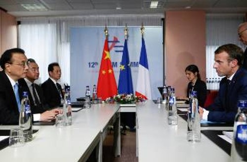 Στο περιθώριο της Συνόδου γίνονται πολλές διμερείς, όπως μεταξύ Γαλλίας - Κίνας