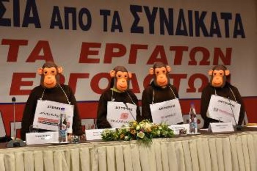 Στο βήμα του συνεδρίου... τα διευθυντικά στελέχη - «μαϊμούδες» εξηγούν τα κοινά συμφέροντα εργοδοτών και εργαζομένων