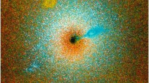 Φωτογραφία της μεγάλης συγκέντρωσης άστρων γύρω από τη μαύρη τρύπα του Μ87. Η πυκνότητα σε άστρα έχει αποδοθεί με ψευδοχρώματα. Η μαύρη περιοχή στο κέντρο είναι εκείνη με τη μέγιστη πυκνότητα και όχι φωτογραφία της μαύρης τρύπας