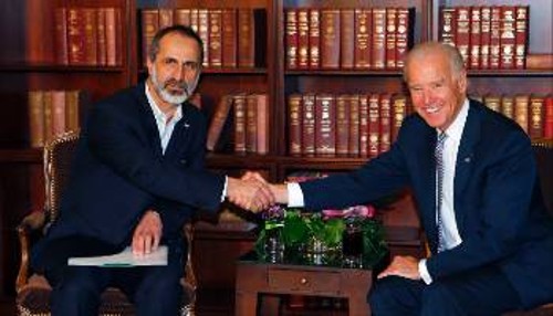 Ο επικεφαλής των αντικαθεστωτικών της Συρίας με τον Αμερικανό αντιπρόεδρο Μπάιντεν
